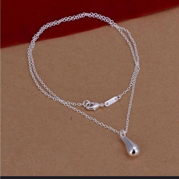 Silver teardrop set marked .925 - Picture 9 of 11